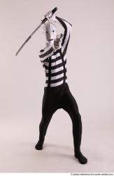Man Adult Athletic Another Fighting with sword Standing poses Casual